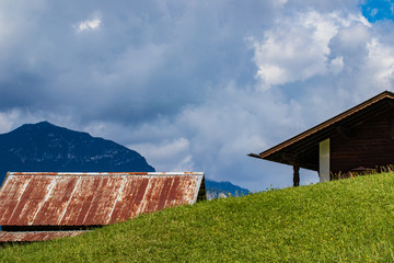 cottage roof cludy sky mountains