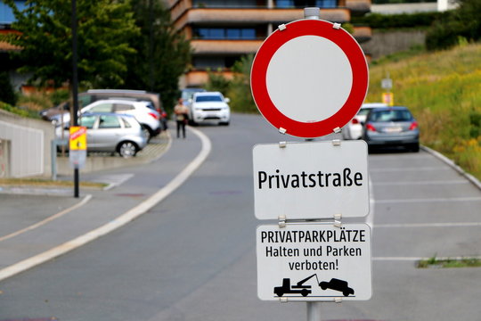 German Signs: Private Parking Area and Private Road, Privatstra&szlig;e und Privatparkpl&auml;tze in einer Wohngebiet