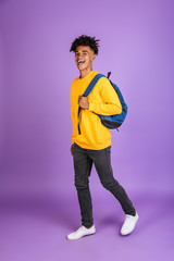 Full length portrait of a cheerful young afro american man