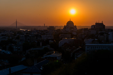Naklejka premium Belgrade panorama with the temple of St. Sava and sunset