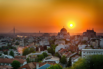 Naklejka premium Belgrade panorama with the temple of St. Sava and sunset