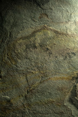 Stone texture background in greenish metal tones