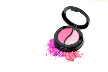 Pastel pink eye shadows palette isolated on white.