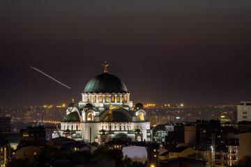 Naklejka premium Belgrade, Serbia - April 10, 2017: Belgrade panorama with the temple of St. Sava by night