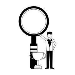 businessman with trophy and magnifying glass