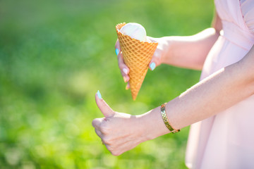 ice cream cone in hands