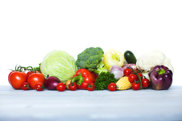 Fototapeta na wymiar Fresh vegetables on wooden background.