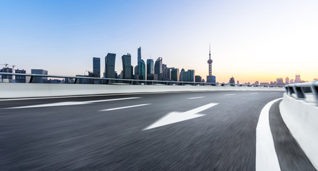 Fototapeta premium city skyline with empty asphalt road in urban