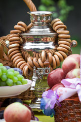 Russian bread, samovar, fruits