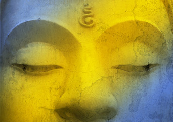 Closeup Buddha image face with vintage filter effect, Symbol of Buddhism
