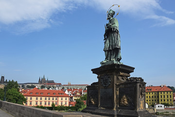 Obraz premium Statue of Saint John of Nepomuk on Charles Bridge in Prague, Czech Republic.