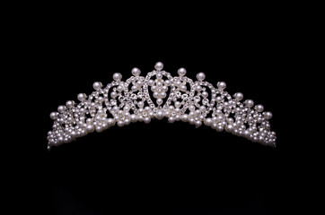 silver diadem with diamonds and pearls isolated on black - obrazy, fototapety, plakaty