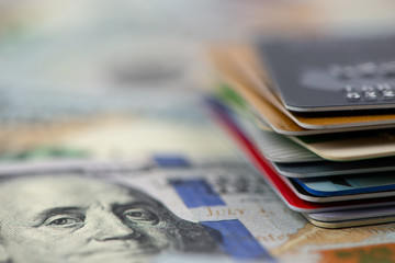 Stack of multicolored credit cards close-up 