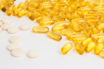 Tablets, pills or vitamins. Fish oil in capsules. Baby and female vitamins.