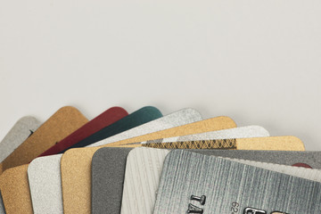 Stack of multicolored credit cards close-up 