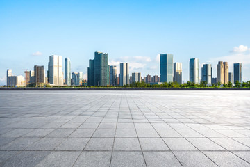 city skyline with empty square