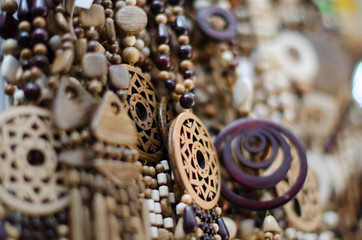 Wooden beads and pendants, wooden women's jewelry on the market
