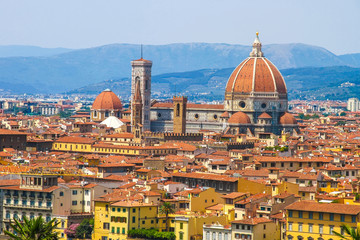 Fototapeta na wymiar Landscape view of the historic buildings of Florence, Italy on a sunny day.