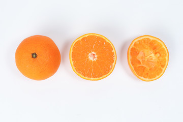 Mandarin Orange Fruit slice half juiced extracted on white background