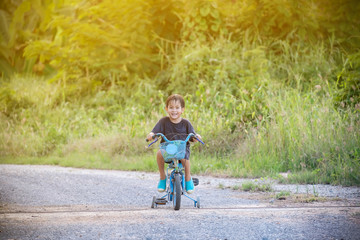Obraz premium the boy is biking