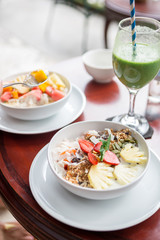 Tasty and healthy oatmeal porridge with fruit, berry, pineapple,strawberry and flax seeds. Healthy eating lifestyle concept. Health care and beauty. Healthy breakfast. Fitness food. Proper nutrition.