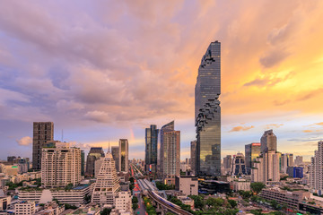 Bangkok business district cityscape with skyscraper at twilight, Thailand