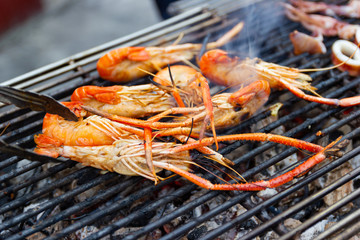 Grilled shrimps seafood on the table in market of Bangkok Thailand 