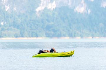 Kayaking adventure. Kayaking in the sea from back view. Kayaking and snorkeling, towards a...