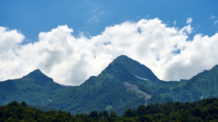 Fototapeta premium Beautiful mountain views with large clouds in Sochi