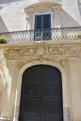 Italy, Lecce,  ancient buildings and streets of the old town, views and details, doors, windows and various architectures.