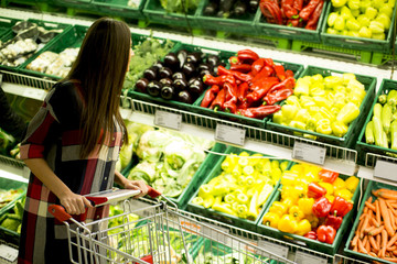 Woman buying vegetable