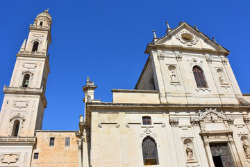 Fototapeta premium Italy, Lecce, Duomo square, in Baroque style, bell tower, view and architectural details.