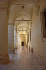 Italy, Lecce, Duomo square, cloister of the Catholic seminary. View and architectural details.
