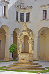 Fototapeta na wymiar Italy, Lecce, Duomo square, cloister of the Catholic seminary. View and architectural details.