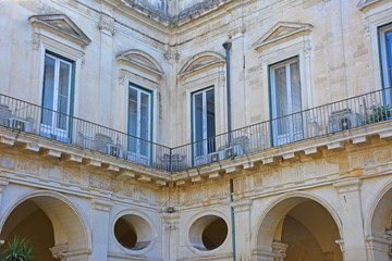 Italy, Lecce, ancient buildings and streets of the old town, views and details, doors, windows and various architectures.