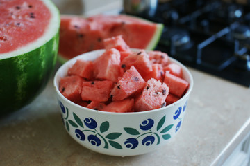 Pieces of watermelon in a large bowl.