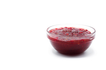 Cranberry sauce in bowl for Thanksgiving dinner isolated on white background. Copyspace