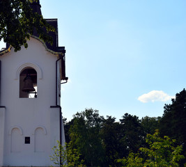 Obraz premium Orthodox monastery in the city of Krasnoyarsk. Orthodox church. Church in the woods. Church bell.