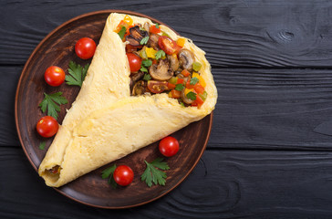 Omelette stuffed with vegetables