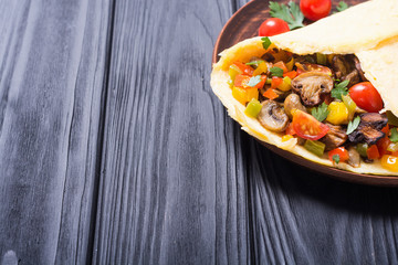 Omelette stuffed with vegetables