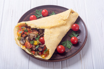 Omelette stuffed with vegetables