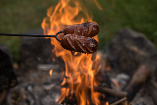 grilled spekacky sausage over open fire