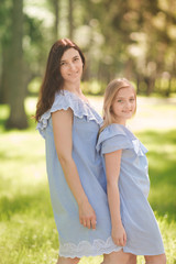 Fototapeta premium Happy mother and daughter in the park