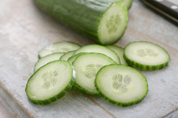 slicing fresh cucumber