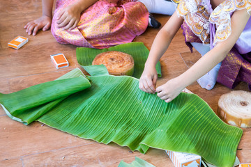 children make krathong form nature object for Loy Krathong festival in november