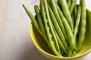 Ingredient for cooking. Vegan food, young bean pod from farmer market.