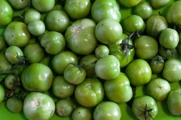 top view fresh green tomatoes in a box