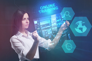 The concept of business, technology, the Internet and the network. A young entrepreneur working on a virtual screen of the future and sees the inscription: Online training