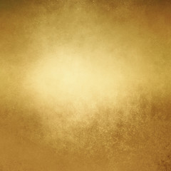 gold background with vintage texture and old brown grunge in an elegant fancy gold foil textured design