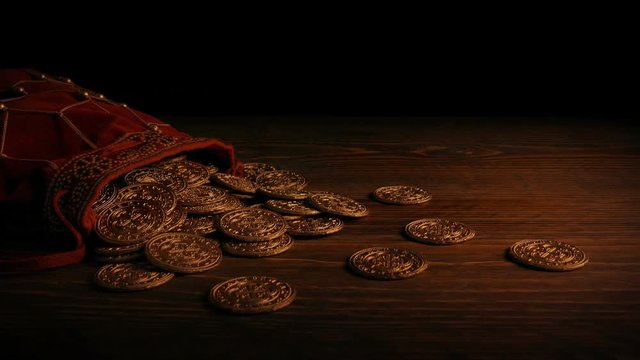 Gold Coins In Bag In Firelight